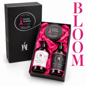 AromaHoliday Bloom Paris gift set with Pink Pepper and Rose wash, lotion and matching travel tin candle.