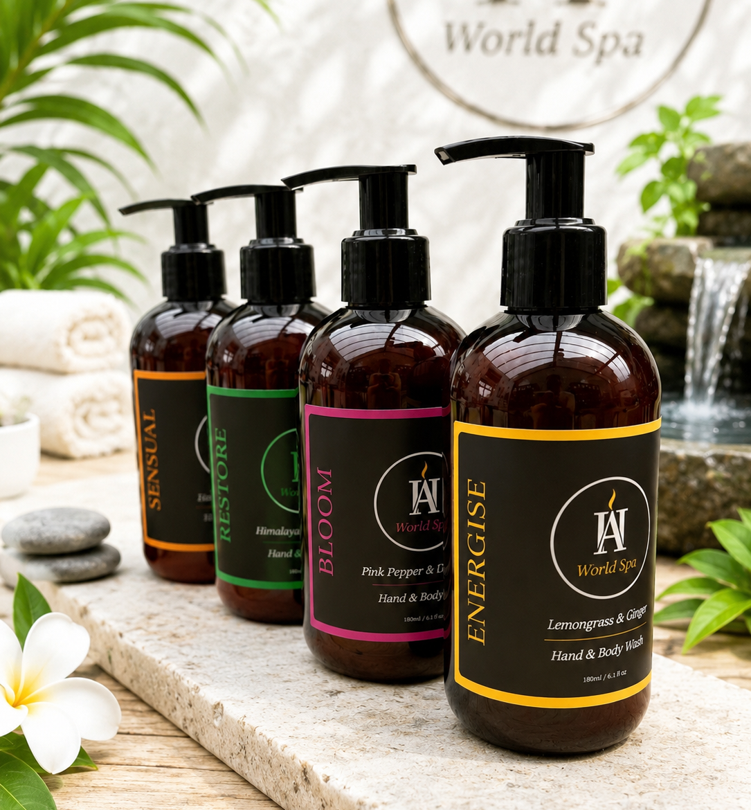 AromaHoliday World Spa luxury hand and body care collection featuring Energise, Bloom, Restore and Sensual fragrances in amber pump bottles inspired by spa destinations around the world.