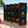 AromaHoliday World of Scents travel-inspired candle collection featuring Oceania, Europe, Asia, Africa and Americas destination candles. Handmade luxury soy candles inspired by Sydney, Hawaii, Auckland, Rome, Paris, Sri Lanka, Cape Town, Mauritius, New York and more, displayed in continent-themed gift sets.
