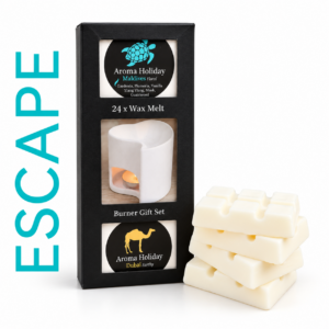 AromaHoliday Dubai and Maldives gift set with a white ceramic wax burner and 24 wax melt cubes in black presentation packaging, with turquoise ESCAPE lettering.